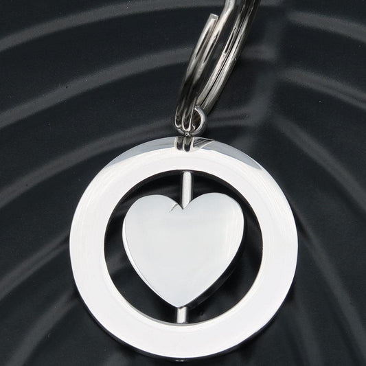 Portachiavi personalizzato inciso "Spinning heart" con incisione su entrambi i lati delle iniziali per coppie